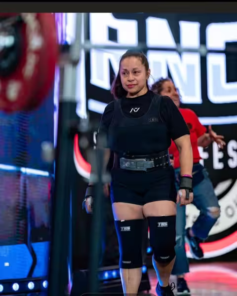 Powerlifter competing with Iron Warrior Gym